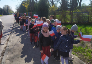 Pochód z flagami ulicami miasta (Bełchatów - Grocholice)